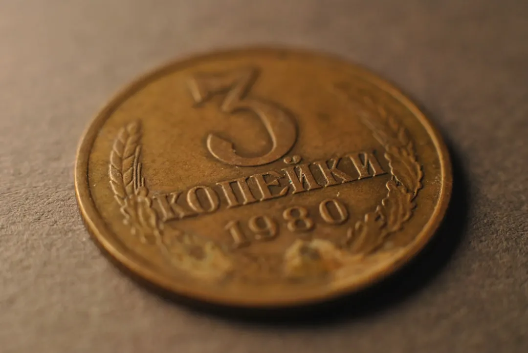 A close up of a coin on a table