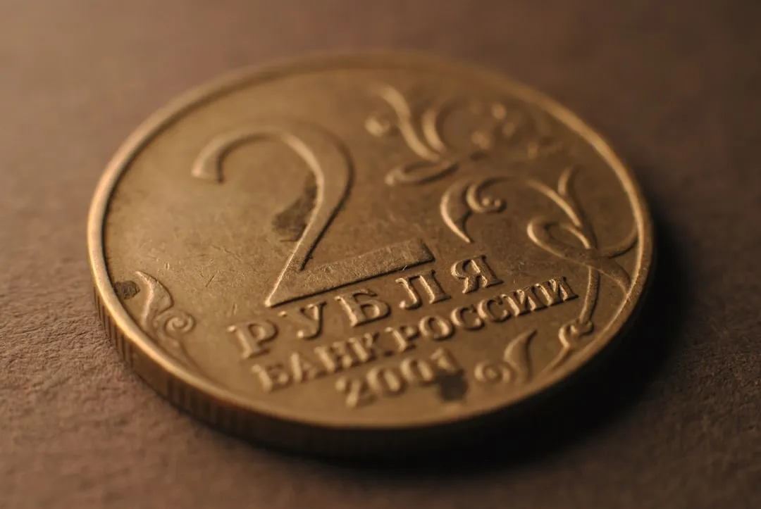 A close up of a coin on a table
