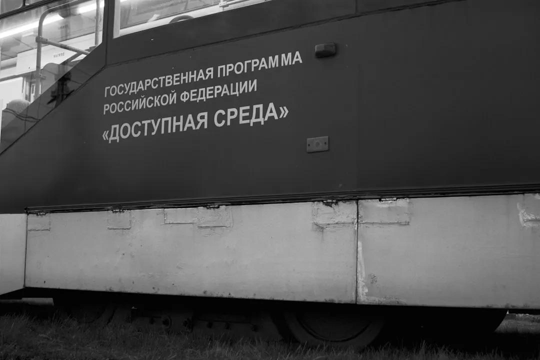 grayscale photo of train door
