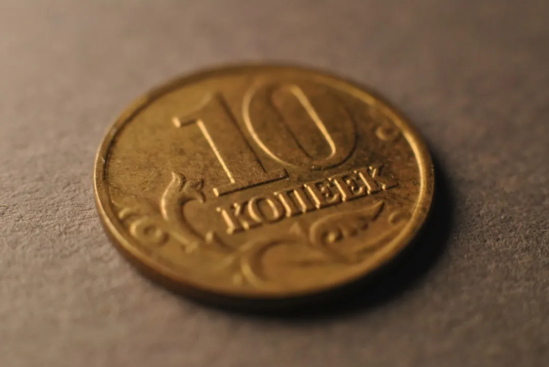 A close up of a coin on a table